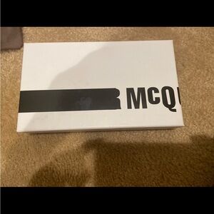 MCQ  zip around wallet  still in box never.